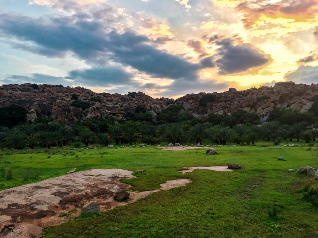Sunset at a meadow in Onake Kindi Cave Paintings of Hampi