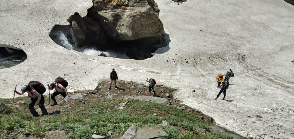 Semi frozen glacier on our way to Hampta Pass