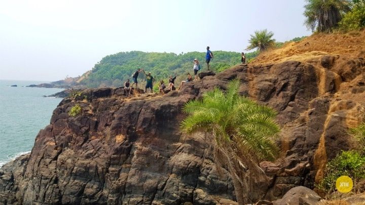 Group Picture taken on a cliff in Gokarna Beach Trek