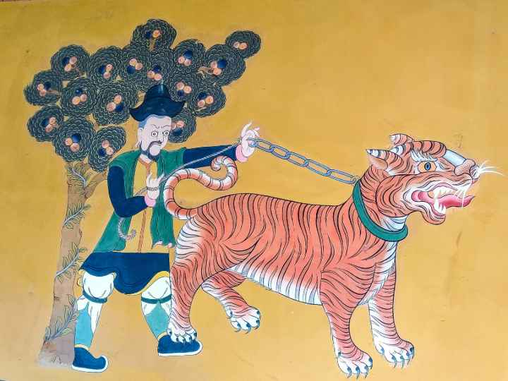 Painting of Guru Rinpoche, flying on a tigress to Tiger's Nest of Bhutan