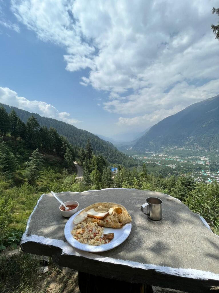 a breakfast plat at footloose camp in sethan himachal pradesh near manali overlooking the valley