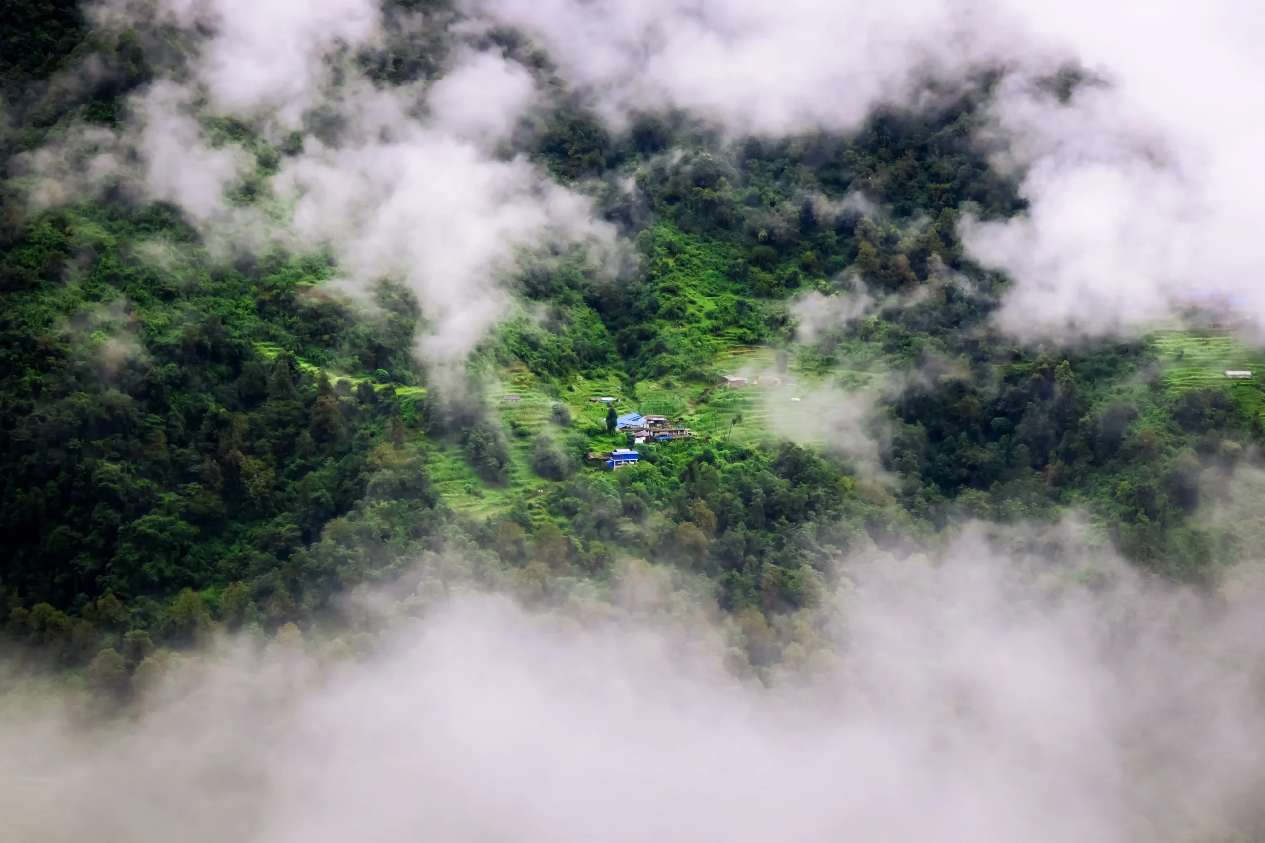 Annapurna Base Camp Trek (ABC) – (Xplore The Earth): Lush Green Valley covered in Clouds