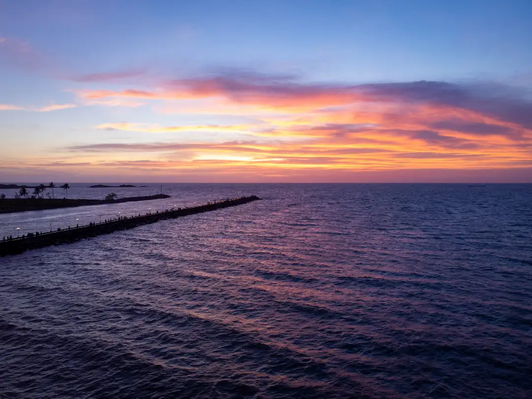 sunset near malpe sea walk in udupi with vibrant colors