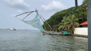 chinese fishing nets of kochi seen from water metro window