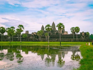 angkor wat of cambodia reflecting in water pond