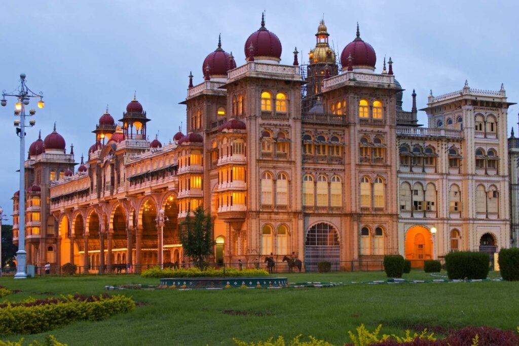 Mysore Palace from outside during the sunset with lights on
